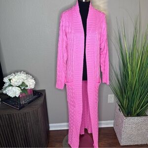 Pink maxi cable knit cardigan.